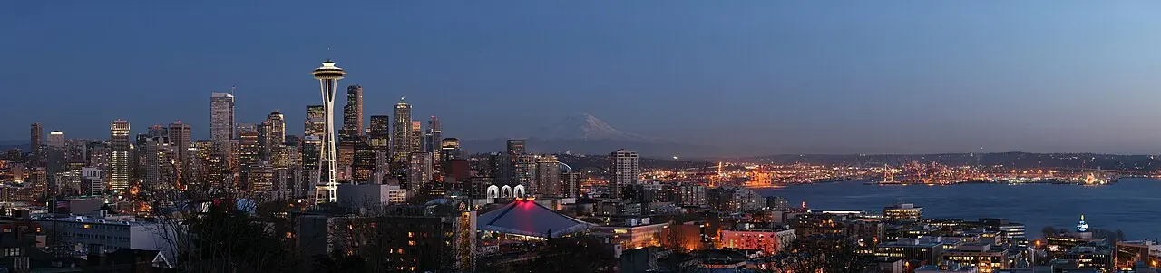 Seattle Skyline view from Queen Anne Hill. The Space Needle is visible on the left, the mountain in the background is Mount Rainier , on the