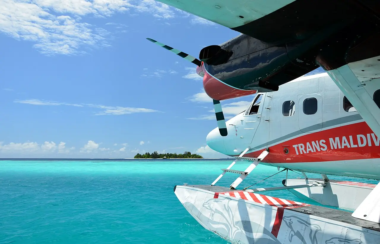 A Trans Maldivian Airways (TMA) floatplane to the north of Bathala island (Maldives).