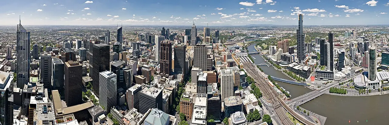 The Melbourne skyline as viewed from the Rialto Observatory on Collins St. This panorama spans facing north (left side) east (centre) to sou