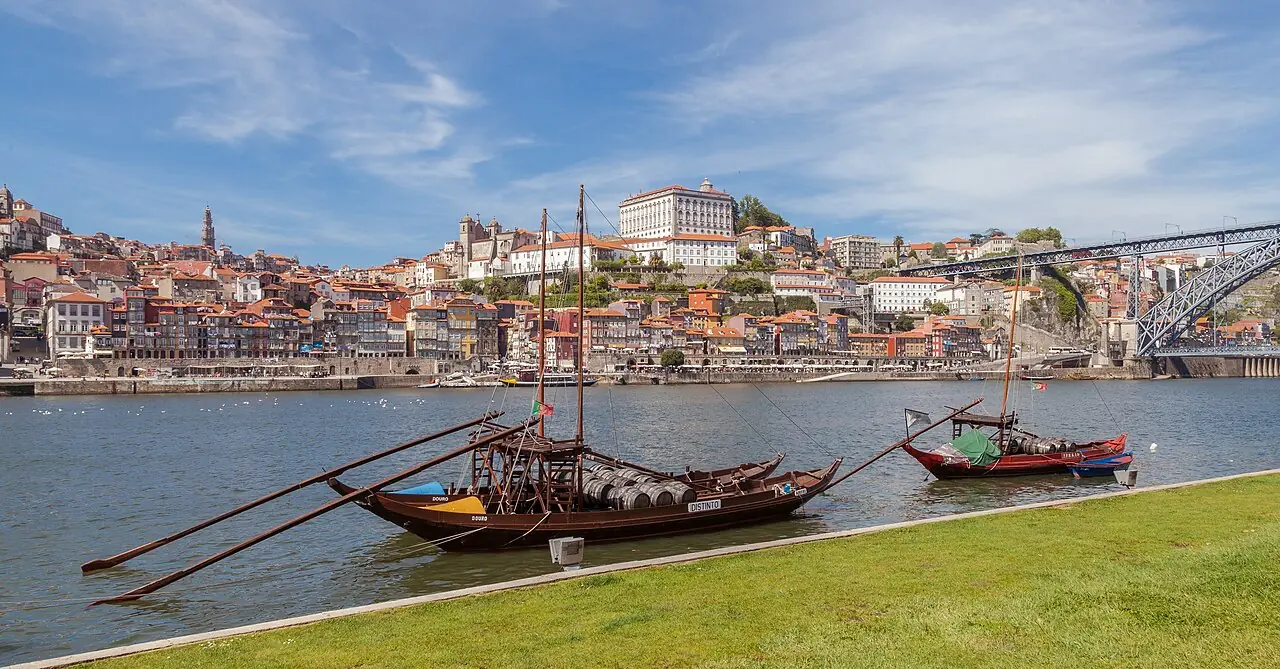 Rabelos in the Douro River with the city of Porto in the background, Portugal. Rabelos are traditional Portuguese wooden cargo boats used fo