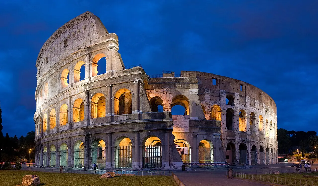 A 4×4 segment panorama of the Colosseum at dusk. Taken by myself with a Canon 5D and 50mm f/1.8 lens at f/5.6.