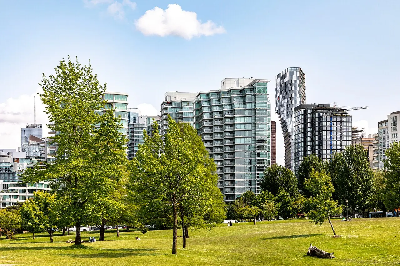Devonian Harbour Park with skyline of the West End district in Vancouver , British Columbia , Canada
