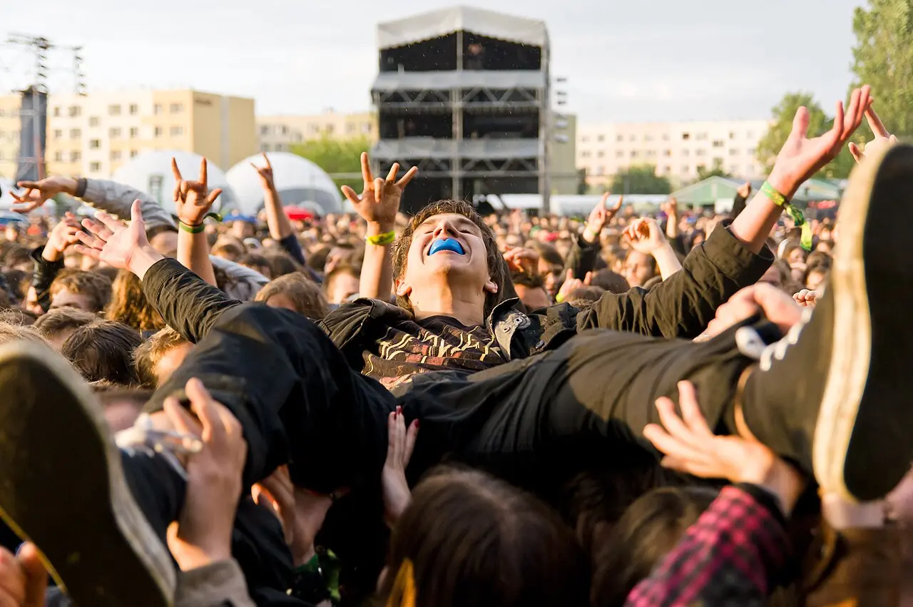 Crowd surfing during Luxtorpeda concert. Ursynalia 2012, Warsaw.