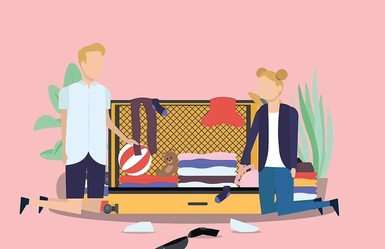 An image of two people packing a suitcase full of unfolded clothes and toys. There are socks strewn across the floor and a teddy is leaning 